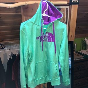 Women’s lime green/purple zip-up sweatshirt.